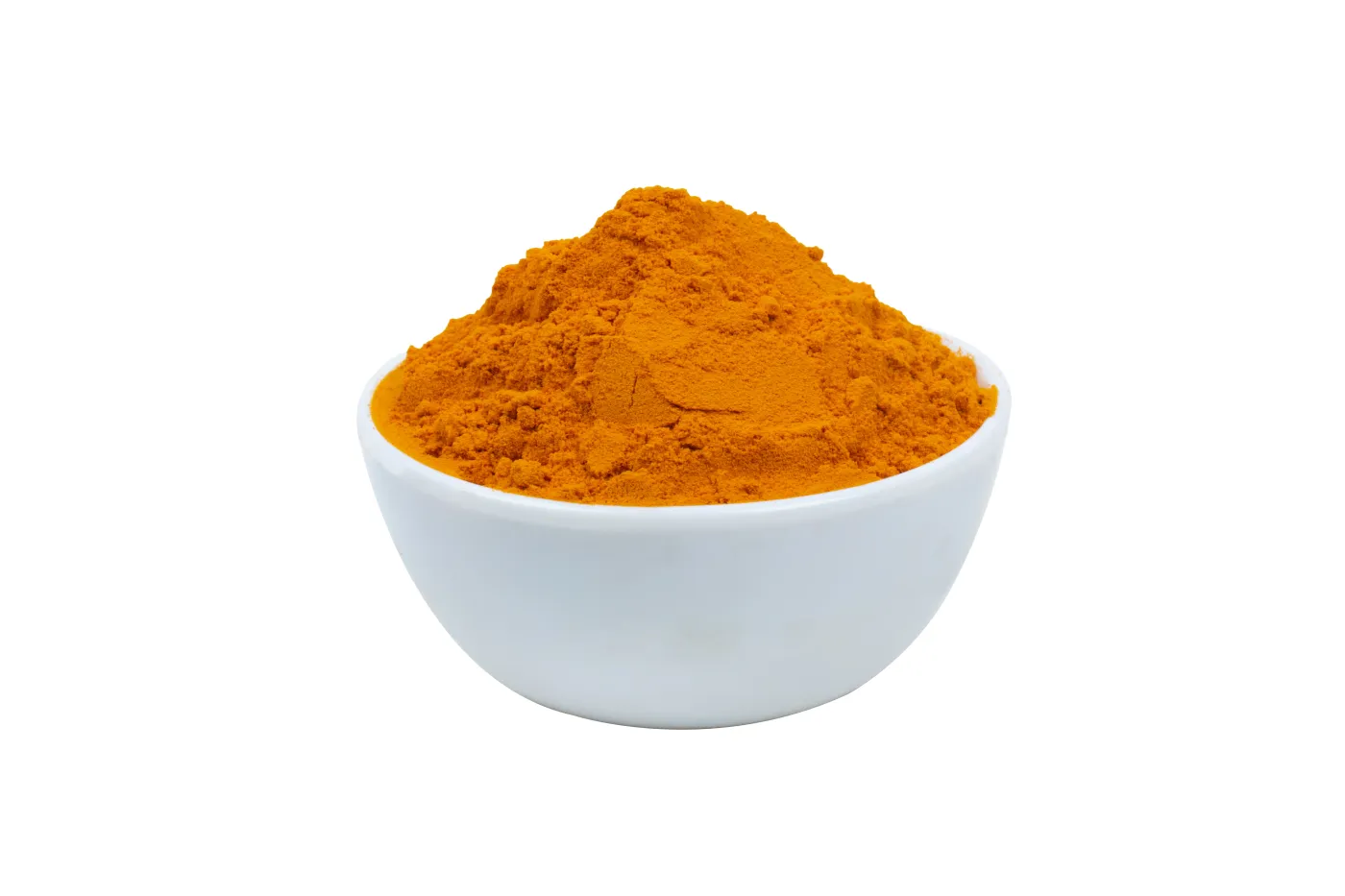 Turmeric powder in a white bowl